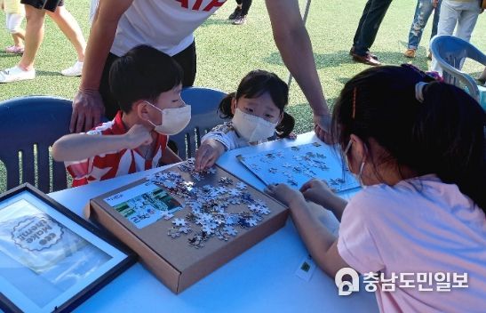 계룡시여성단체협의회, 가족사진 퍼즐 맞추기 프로그램 열어